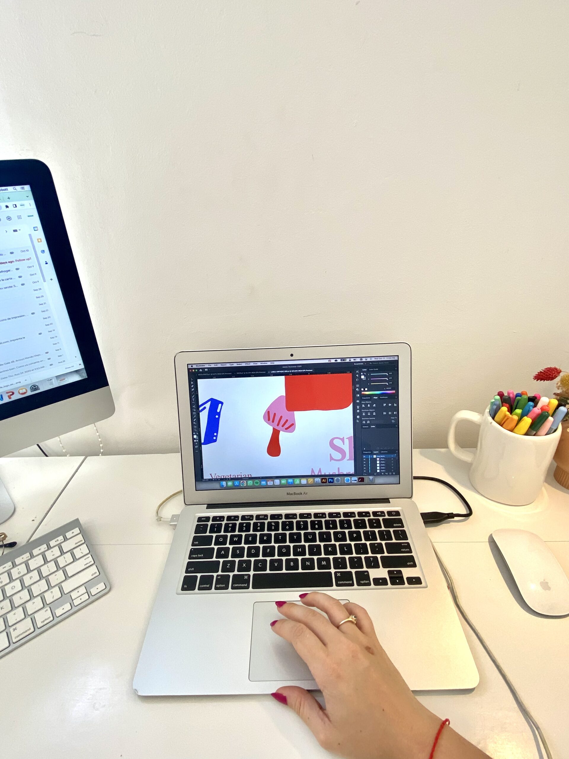 a web designer designs a website for a Maine small business on Showit